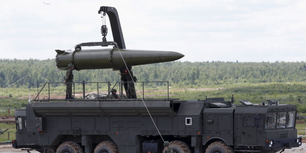 Russian servicemen equip an Iskander tactical missile system at the Army-2015 international military-technical forum in Kubinka, outside Moscow, Russia, June 17, 2015. REUTERS/Sergei Karpukhin