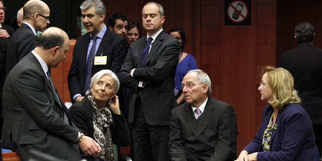 (L-R) France's Finance Minister Pierre Moscovici, International Monetary Fund (IMF) managing director Christine Lagarde, Germany's Finance Minister Wolfgang Schauble and Austria's Finance Minister Maria Fekter chat at the start of a Eurogroup meeting at the European Council building in Brussels, March 24, 2013. REUTERS/Sebastien Pirlet (BELGIUM - Tags: POLITICS BUSINESS)