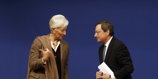 International Monetary Fund (IMF) Managing Director Christine Lagarde (L) and European Central Bank (ECB) President Mario Draghi leave after the conference "Growth and integration in solidarity: what strategy for Europe?" with top financial officials at the Economy ministry in Paris November 30, 2012. REUTERS/Charles Platiau (FRANCE - Tags: POLITICS BUSINESS)