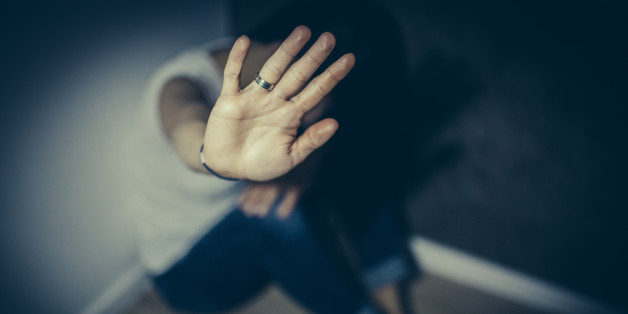 An abused woman trying to defend herself