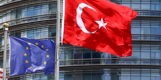 European Union (L) and Turkish flags fly outside a hotel in Istanbul, Turkey May 4, 2016. REUTERS/Murad Sezer/File Photo