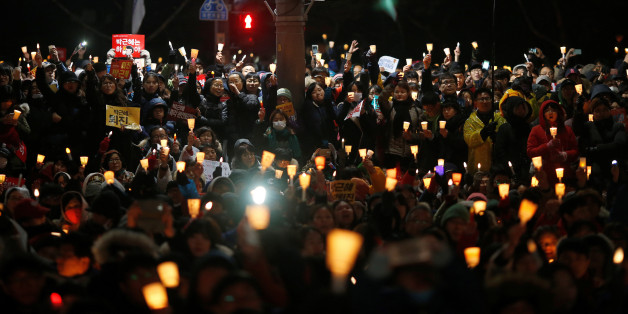 People attend a protest calling for Park Geun-hye to step down in central Seoul, South Korea, November 26, 2016. REUTERS/Kim Hong-Ji
