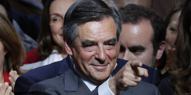 Francois Fillon, former French prime minister and member of Les Republicains political party, attends a rally as he campaigns in the second round for the French center-right presidential primary election in Paris, France, November 25, 2016. REUTERS/Philippe Wojazer