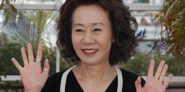 Cast member Youn Yuh-jung poses during a photocall for the film "Da-Reun Na-Ra-E-Suh", by director Hong Sangsoo, at the 65th Cannes Film Festival, May 21, 2012. REUTERS/Vincent Kessler (FRANCE - Tags: ENTERTAINMENT)