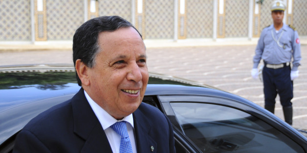 Tunisia's Foreign Minister Khemaies Jhinaoui arrives for a cabinet meeting in Tunis, Wednesday Aug. 31, 2016. Tunisia's Parliament has approved Youssef Chahed as prime minister along with a new government focused on boosting the economy and fighting terrorism. (AP Photo/Riadh Dridi)