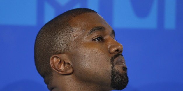 Rapper Kanye West arrives at the 2016 MTV Video Music Awards in New York, U.S., August 28, 2016. REUTERS/Eduardo Munoz