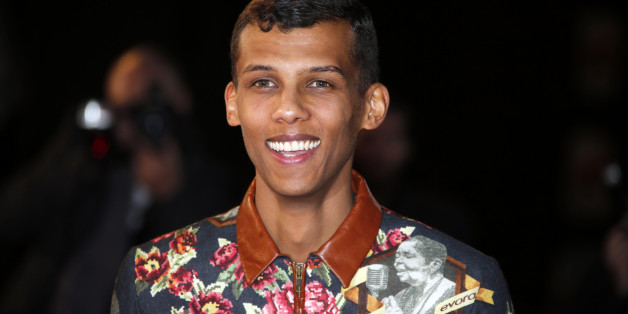 Belgian singer Stromae arrives for the NRJ Music Awards ceremony at the Festival Palace in Cannes December 13, 2014. REUTERS/Eric Gaillard (FRANCE - Tags: ENTERTAINMENT)