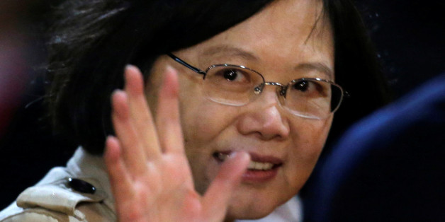 Taiwan's President Tsai Ing-wen gestures after her arrival at the Silvio Pettirossi International airport in Luque, Paraguay, June 27, 2016. REUTERS/Jorge Adorno