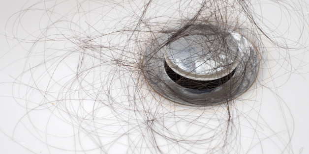 Hair loss problem in white sink.