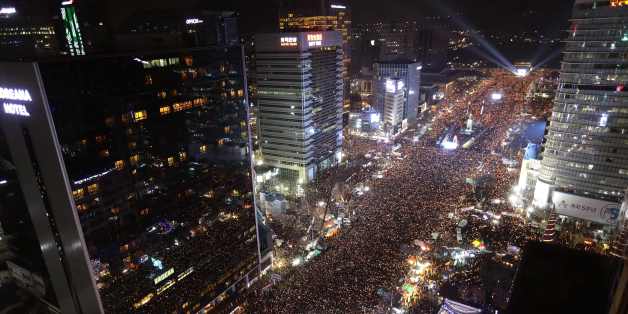 Protesters gather for a rally against South Korea's President Park Geun-hye in Seoul on December 3, 2016.Hundreds of thousands of protestors marched in Seoul for the sixth-straight week on December 3 to demand the ouster and arrest of scandal-hit Park ahead of an impeachment vote in parliament. / AFP / POOL / Chung Sung-Jun (Photo credit should read CHUNG SUNG-JUN/AFP/Getty Images)