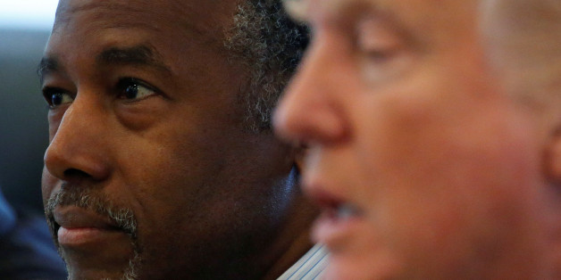 Ben Carson (L) and Republican presidential then nominee Donald Trump speak during a round table with the Republican Leadership Initiative at Trump Tower in the Manhattan borough of New York, U.S. August 25, 2016. REUTERS/Carlo Allegri/File Photo