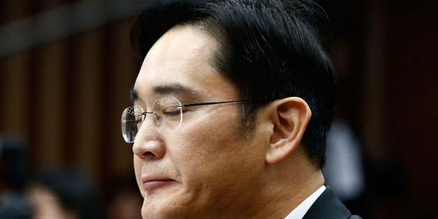SEOUL, SOUTH KOREA - DECEMBER 06: Lee Jae-Yong, vice chairman of Samsung answers questions during a parliamentary hearing of the probe in Choi Soon-sil gate at the National Assembly on December 6, 2016 in Seoul, South Korea. South Korea started the parliament hearing with leaders of nine South Korean conglomerates including Samsung, Hyundai, Lotte over the tens of millions of dollars given to foundations controlled by Ms Park's friend Choi Soon-sil, the woman at the center of the scandal. (Pho