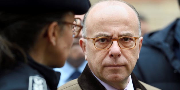 French Interior Minister Bernard Cazeneuve talks with a police chief as part of a visit focused on security measures at Jewish schools on December 2, 2016 in Paris. / AFP / ERIC FEFERBERG (Photo credit should read ERIC FEFERBERG/AFP/Getty Images)