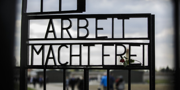 ORANIENBURG, GERMANY - APRIL 19:
'Arbeit Macht Frei' ('Work Makes Free') inscription at the original entrance gate during ceremonies marking the 70th anniversary of the liberation of Sachsenhausen at the former Sachsenhausen concentration camp near Berlin on April 19, 2015 in Oranienburg, Germany. The Nazis ran Sachsenhausen from 1936-1945, using it initially for political prisoners, then later also for resistance fighters from across Europe, Soviet prisoners of war, Jews, homosexuals, Jehova's Witnesses and other victims. The camp included a gas chamber, execution pit and ovens for burning bodies, and an estimated 30,000 inmates died. Soviet and Polish forces liberated the camp on April 22, 1945. (Photo by Thomas Trutschel/Photothek via Getty Images)