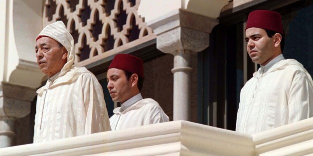 Moroccan King Hassan II (L) listens to the national anthem with his sons Crown Prince Sidi Mohammed and Moulay Rachid (R) at a ceremony at the royal palace in Rabat March 3. King Hassan marked his 37th anniversary of acceding to the throne on Tuesday.
MOROCCO