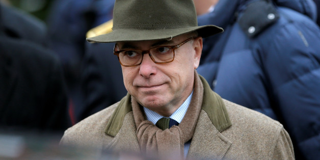 French Interior Minister Bernard Cazeneuve leaves after a visit at the traditional Christkindelsmaerik (Christ Child market) in Strasbourg, France, November 26, 2016. REUTERS/Vincent Kessler