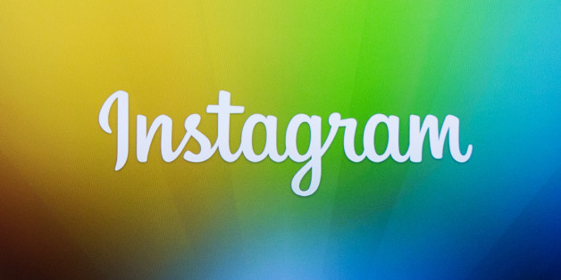 A screen displays the Instagram logo during a presentation by co-founder Kevin Systrom as he announces the launch of a new direct image messaging service named Instagram Direct in New York December 12, 2013. REUTERS/Lucas Jackson (UNITED STATES - Tags: SCIENCE TECHNOLOGY BUSINESS)