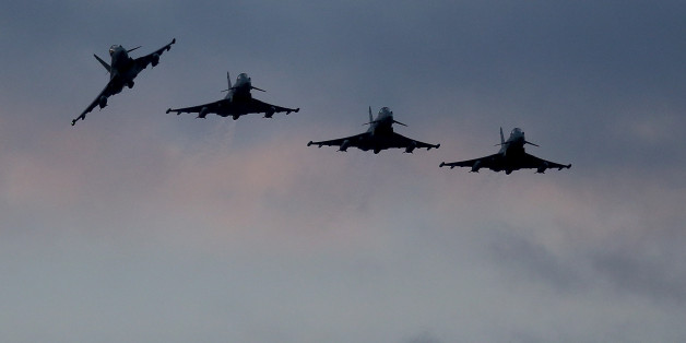 AKROTIRI, CYPRUS - DECEMBER 03: Four RAF Typhoons arrive at RAF Akrotiri on December 3, 2015 in Akrotiri, Cyprus. The RAF has sent two further Tornado aircraft and six Typoons to bolster aircraft now flying sorties to both Iraq and Syria. The UK government voted yesterday to authorise air strikes against so-called Islamic State targets in Syria. (Photo by Matt Cardy/Getty Images)