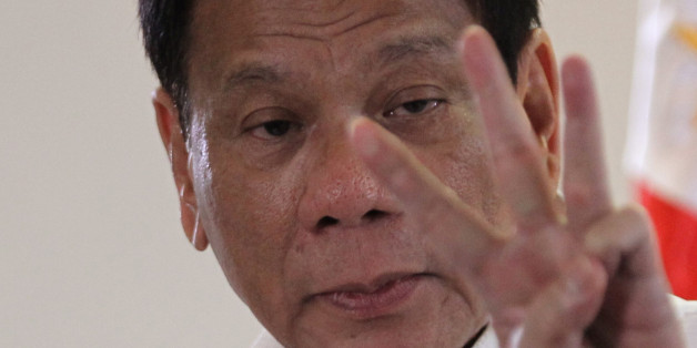 Philippine President Rodrigo Duterte speaks upon his arrival at Davao International Airport in Davao city, Philippines, after returning from a leaders' summit in Peru of the Asia-Pacific Economic Cooperation (APEC), November 23, 2016. REUTERS/Lean Daval Jr