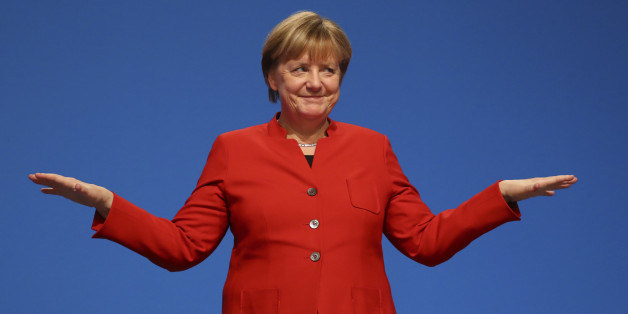 German Chancellor and leader of the conservative Christian Democratic Union party CDU Angela Merkel reacts after her speech at the CDU party convention in Essen, Germany, December 6, 2016. REUTERS/Kai Pfaffenbach TPX IMAGES OF THE DAY