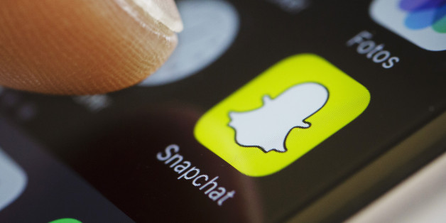 BERLIN, GERMANY - SEPTEMBER 27: In this photo illustration the app of Snapchat is displayed on a smartphone on September 27, 2016 in Berlin, Germany. (Photo Illustration by Thomas Trutschel/Photothek via Getty Images)