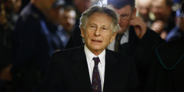 Filmmaker Roman Polanski walks on a corridor during a break of a court hearing in Krakow February 25, 2015. Polanski testified at a hearing in Poland on Wednesday regarding a U.S. request for his extradition over a 1977 child sex crime conviction, though the court said it needed more time to make a decision. REUTERS/Kacper Pempel (POLAND - Tags: CRIME LAW ENTERTAINMENT)