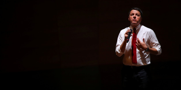 Italian Prime Minister Matteo Renzi talks during a meeting in support of the 'Yes' vote in the upcoming constitutional reform referendum in Rome, Italy November 26, 2016. REUTERS/Alessandro Bianchi
