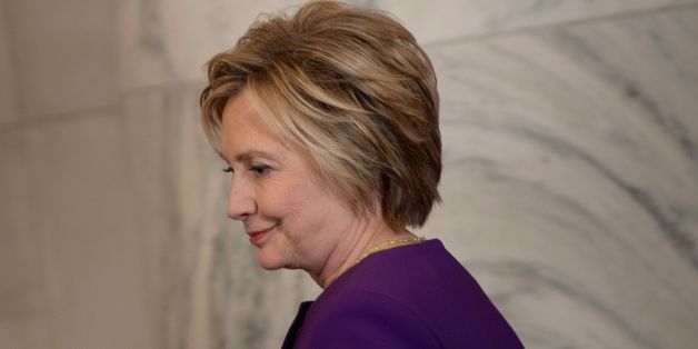 Former Democratic presidential candidate Hillary Clinton arrives for a portrait unveiling for outgoing Senate Minority Leader Senator Harry Reid (D-NV) on Capitol Hill December 8, 2016 in Washington, DC. / AFP / Brendan Smialowski (Photo credit should read BRENDAN SMIALOWSKI/AFP/Getty Images)