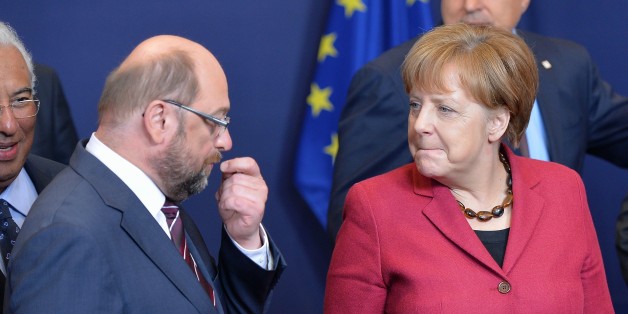 BRUSSELS, BELGIUM - MARCH 17: (R to L) German Chancellor Angela Merkel and President of European Parliament Martin Schultz talk together on the first day of two days longn European Union (EU) Summit at the Council of the European Union in Brussels, Belgium on March 17, 2016. (Photo by Dursun Aydemir/Anadolu Agency/Getty Images)