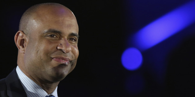 Haiti's Prime Minister Laurent Lamothe looks on at a Salesforce.com Dreamforce event in San Francisco, California November 19, 2013. Lamothe attended to listen to the keynote address of Salesforce CEO Marc Benioff. REUTERS/Robert Galbraith (UNITED STATES - Tags: SCIENCE TECHNOLOGY POLITICS HEADSHOT BUSINESS)