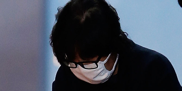 SEOUL, SOUTH KOREA - NOVEMBER 03: Choi Soon-Sil, a confidant of South Korean President Park Geun-Hye, is to get on a bus of Ministry of Justice as she leaves the Seoul Central District Court on November 3, 2016 in Seoul, South Korea. The prosecutors was issued an arrest warrant for Choi Soon-sil for allegedly influencing state affairs and embezzling money by taking advantage of her close relationship with President Park Geun-hye. (Photo by Korea Pool/Getty Images)