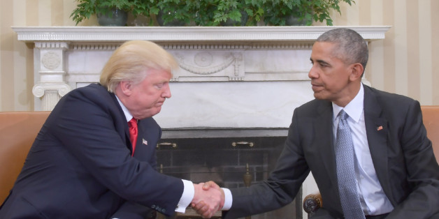 US President Barack Obama shakes hands as he meets with Republican President-elect Donald Trump on transition planning in the Oval Office at the White House on November 10, 2016 in Washington,DC. / AFP / JIM WATSON (Photo credit should read JIM WATSON/AFP/Getty Images)