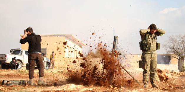 ALEPPO, SYRIA - DECEMBER 11: Members of Free Syrian Army attack Daesh terrorists' positions with heavy artillery during the 'Operation Euphrates Shield' in the al-Bab of Aleppo, Syria on December 11, 2016. (Photo by Huseyin Nasir /Anadolu Agency/Getty Images)