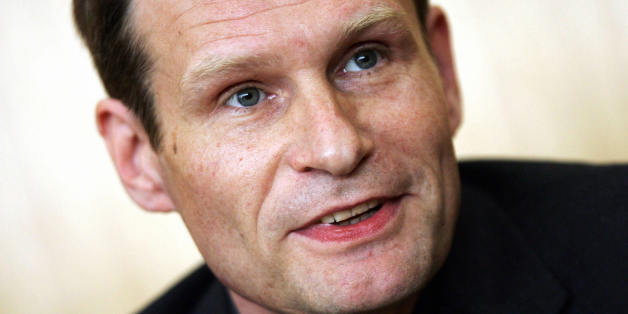 FILES - Picture taken 09 May 2006 in Frankfurt/Main shows self-confessed German cannibal Armin Meiwes waiting for the beginning of a session of his re-trial . Meiwes, convicted of killing and eating a volunteer he met on the Internet has joined an ecology group in prison, a Greens official said 19 November 2007 but denied he was now a party member. The Greens deputy in the western state of Hesse, Kai Klose, confirmed media reports that the murder convict had joined a jail organisation espousing