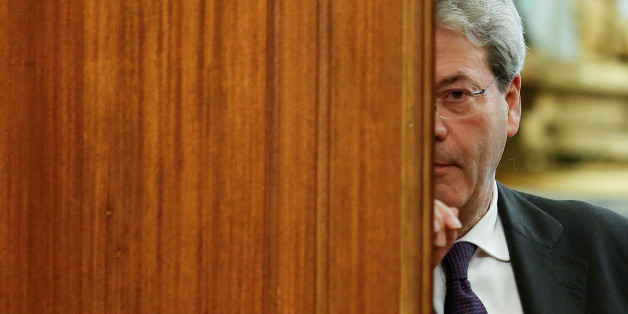 Italian Prime Minister-designate Paolo Gentiloni leaves at the end of a meeting at the Low Chamber in Rome, Italy December 12, 2016. REUTERS/Remo Casilli