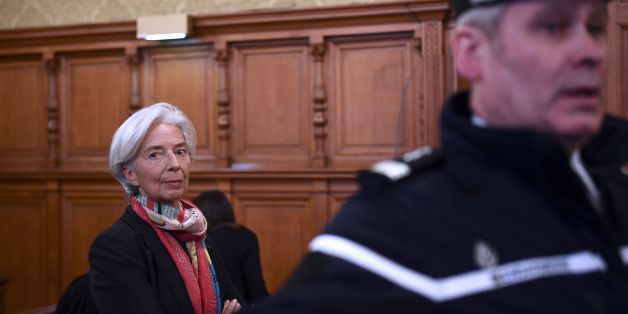 IMF chief Christine Lagarde is pictured in the courtroom at the Paris courthouse on December 12, 2016 prior to the start of her trial before the Court of Justice of the Republic, a special tribunal used to try ministers.
IMF chief Christine Lagarde goes on trial in France on December 12 over a massive state payout to a flamboyant tycoon when she was finance minister in a case that risks tarnishing her stellar career. / AFP / Martin BUREAU (Photo credit should read MARTIN BUREAU/AFP/Getty Images)