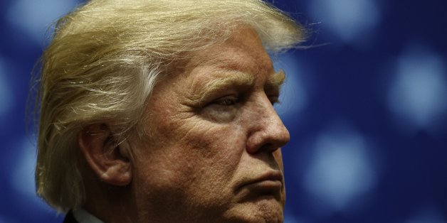 GRAND RAPIDS, MI - DECEMBER 9: President-elect Donald Trump looks on during at the DeltaPlex Arena, December 9, 2016 in Grand Rapids, Michigan. President-elect Donald Trump is continuing his victory tour across the country. (Photo by Drew Angerer/Getty Images)