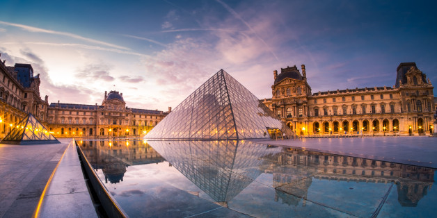This photo of Louvre museum was taken during the sunrise of september. The pool water reflect their beautiful lights and architecture.