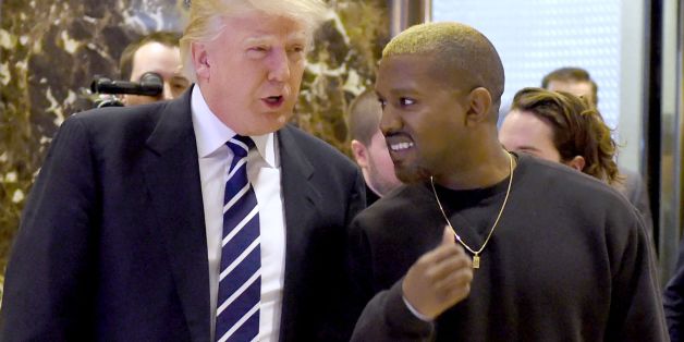 Singer Kanye West and President-elect Donald Trump arrive to speak with the press after their meetings at Trump Tower December 13, 2016 in New York. / AFP / TIMOTHY A. CLARY (Photo credit should read TIMOTHY A. CLARY/AFP/Getty Images)