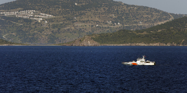 A Turkish Coast Guard vessel patrols the Aegean Sea, off the Turkish coast, Thursday, April 21, 2016, as seen from the NATO German warship FGS Bonn, also on patrol in the Aegean Sea. The Bonn is part of the NATO flotilla patrolling the Aegean in an effort to curb migrant activity between Turkey and Greece. (AP Photo/Lefteris Pitarakis)