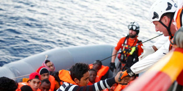 Migrants are seen during rescue operation in the Mediterranea Sea October 20, 2016. Yara Nardi/Italian Red Cross press office/Handout via Reuters ATTENTION EDITORS - THIS IMAGE WAS PROVIDED BY A THIRD PARTY. EDITORIAL USE ONLY.