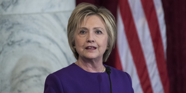 UNITED STATES - DECEMBER 08: Former Secretary of State Hillary Clinton speaks during a portrait unveiling ceremony for retiring Senate Minority Leader Harry Reid, D-Nev., in Russell Building's Kennedy Caucus Room, December 08, 2016. (Photo By Tom Williams/CQ Roll Call)