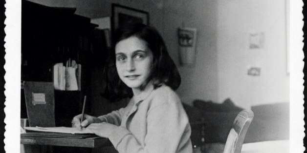 - HANDOUT PHOTO - A hand out picture received on December 17, 2004 shows Anne Frank at her desk in her house at the Merwedeplein in Amsterdam. The Amsterdam apartment where Anne Frank began her diary before going into hiding from the Nazis will become a writers' residence, 60 years after she died in a concentration camp. Frank started her diary in the apartment at Merwedeplein in southern Amsterdam in June 1942, weeks before disappearing into the secret annex of a canal-side warehouse in the cit
