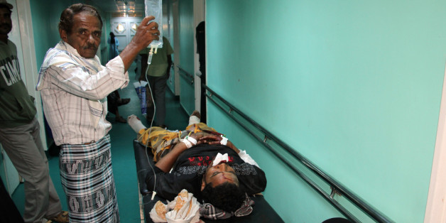 A wounded Yemeni receives treatment at a hospital in Aden on December 18, 2016, after a suicide bomber targeted a crowd of soldiers at al-Sawlaba base. A suicide bomber killed at least 30 Yemeni soldiers when he detonated his targeting a crowd of soldiers gathered to collect their salaries at a base in northeastern Aden, military officials and medics said. / AFP / SALEH AL-OBEIDI (Photo credit should read SALEH AL-OBEIDI/AFP/Getty Images)