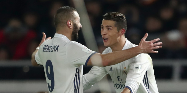 Real Madrid forward Cristiano Ronaldo (R) celebrates scoring during extra-time with teammate Karim Benzema during the Club World Cup football final match between Kashima Antlers of Japan and Real Madrid of Spain at Yokohama International stadium in Yokohama on December 18, 2016. / AFP / Behrouz MEHRI (Photo credit should read BEHROUZ MEHRI/AFP/Getty Images)