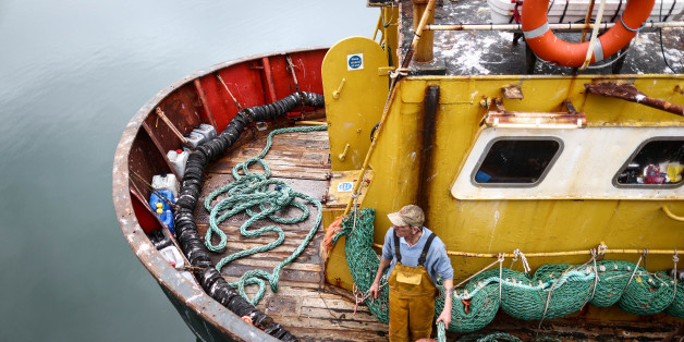 A fisherman prepares for the departure of the Trevessa IV fishing trawler vessel in Newlyn harbour in Newlyn, U.K., on Friday, Aug. 12, 2016. As an island with a long coastline positioned close to the productive fishing grounds of the European continental shelf the U.K. has a long history of fishing, according to a report published on the United Nations' Food & Agriculture Organization website. Photographer: Simon Dawson/Bloomberg via Getty Images
