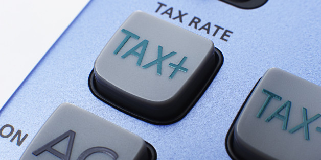 Close-up of tax rate button on calculator