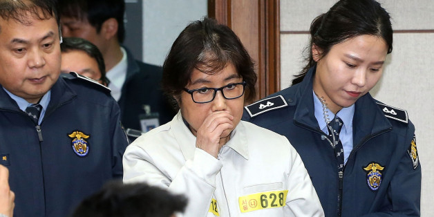 SEOUL, SOUTH KOREA - DECEMBER 19: (SOUTH KOREA OUT) Choi Soon-Sil, the jailed confidante of disgraced South Korean President Park Geun-Hye, appears for the first day of her trial at the Seoul Central District Court on December 19, 2016 in Seoul, South Korea. Choi Soon-sil, the close friend of President Park Geun-hye, who is at the center of possible corruption scandal that has been leading the president's impeachment appeared at the first court hearing. (Photo by Korea Pool via Getty Images)