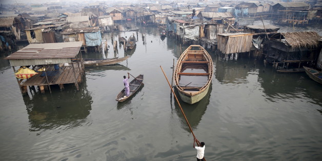 A view of the Makoko fishing community is seen from top of a floating school on the Lagos Lagoon, Nigeria February 29, 2016. In Makoko, a sprawling slum of Nigeria's megacity Lagos, a floating school capable of holding up to a hundred pupils has since November brought free education to the waterways known as the Venice of Lagos. It offers the chance of social mobility for youngsters who, like most of the city's 21 million inhabitants, lack a reliable electricity and water supply and whose water-