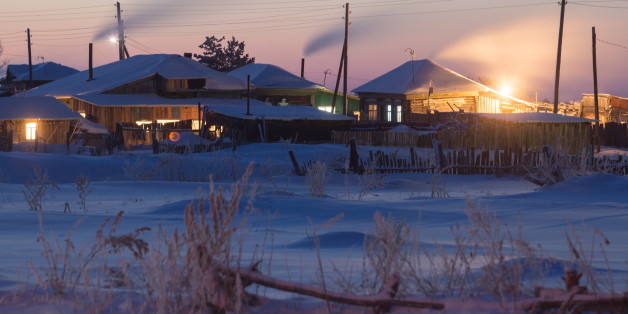 OMSK REGION, RUSSIA - DECEMBER 18, 2016: Snow covered residential houses in the village of Bolsherechye. Dmitry Feoktistov/TASS (Photo by Dmitry Feoktistov\TASS via Getty Images)